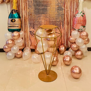 Rose Gold Bride-to-Be Balloon Decoration Kit with Sequin Backdrop and Champagne Bottle Foils.