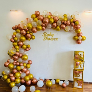 Rose Gold and Gold Baby Shower Balloon Arch with BABY Box Blocks.