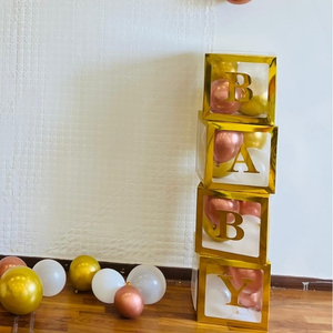 Rose Gold and Gold Baby Shower Balloon Arch with BABY Box Blocks.