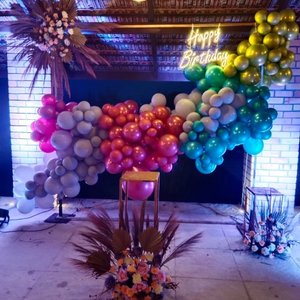 Vibrant Multi-Color Organic Balloon Cloud with Neon Sign and Boho Floral Kit