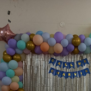 Pastel Garland Silver Fringe Backdrop with Star Accents