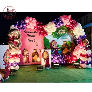 Masha and Bear themed 3rd birthday decoration with colorful balloon garland, character cutouts, themed backdrop and number 3