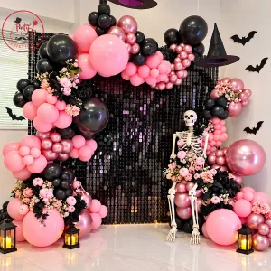 Pink & Black Halloween Balloon Decoration with Skeleton, Floral Arch & Sequin Backdrop