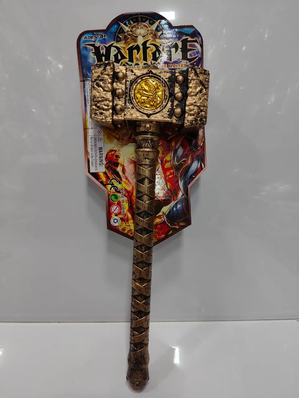 Halloween fantasy warrior toy hammer with decorative gold and brown design