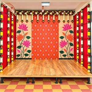 Traditional Floral Stage Decoration with Red & Orange Backdrop